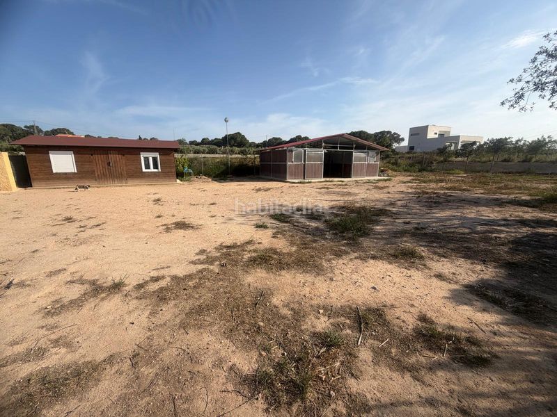 Foto f0a9ea49-4aa9-4a4e-ae43-5e08aefa6d2d. Casa amb aparcament piscina a La Marina Elche / Elx