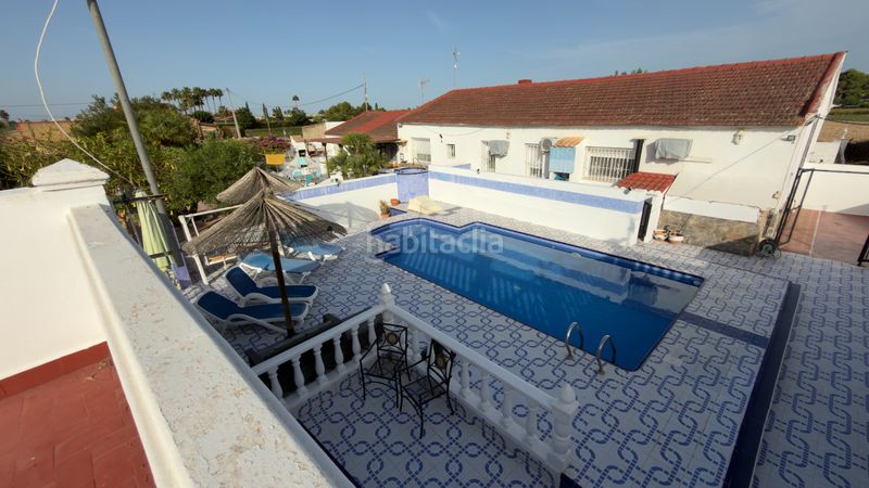 Foto c2389281-e44c-4e16-a430-97b949dd8dba. Xalet amb aparcament piscina a Dolores
