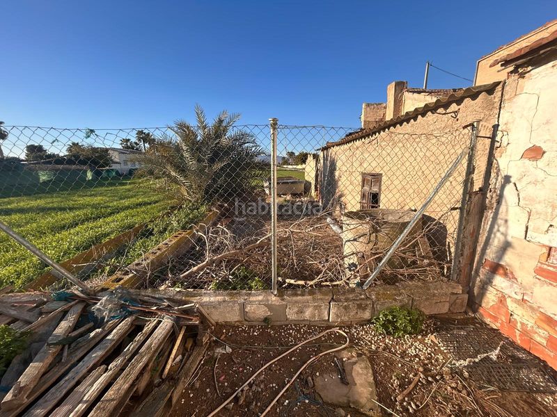 Foto 9b1d2c15-e278-4200-b16e-e7ac877f7e95. Masia amb aparcament a Catral