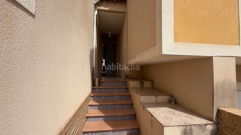 Foto bad338d8-eaa2-4868-9df5-877b53a9ab18. Casa adossada amb aparcament a Daya Nueva