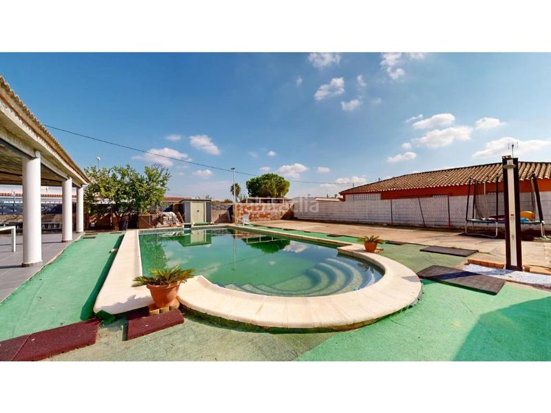 Foto f80c2975-25a6-4246-ab49-bc0103fac71d. Casa con parcheggio piscina in Polígono del Aeropuerto Manises