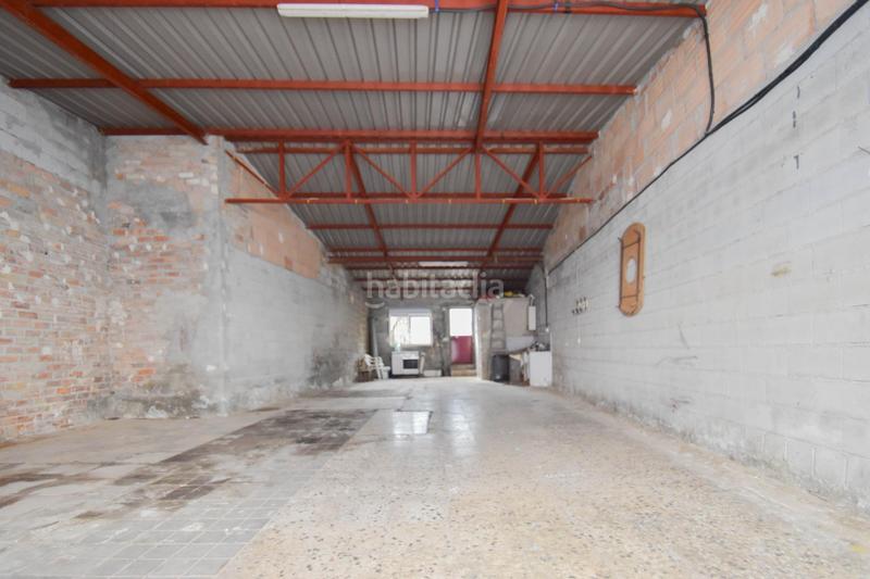 Foto ba576540-c8c0-470c-bc9a-e715f89d038c. Local comercial navealmacen en suelo urbano en Alfacar