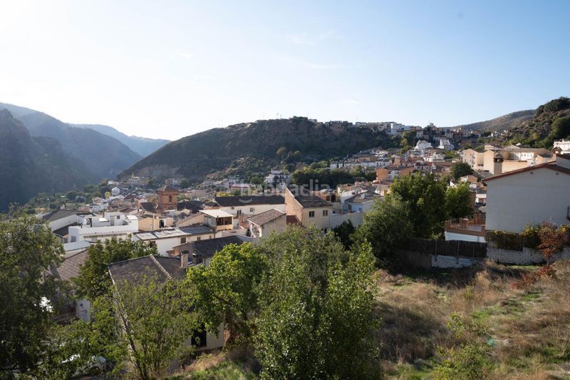 Foto 1036c0a1-500b-4750-b4ad-8dd3a9469f85. Casa amb aparcament a Güéjar Sierra