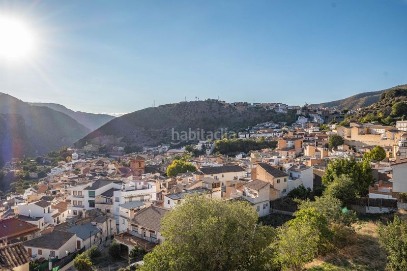 Foto c30dcd2d-064e-4dbe-9111-bb4e5731d5a7. Casa amb aparcament a Güéjar Sierra