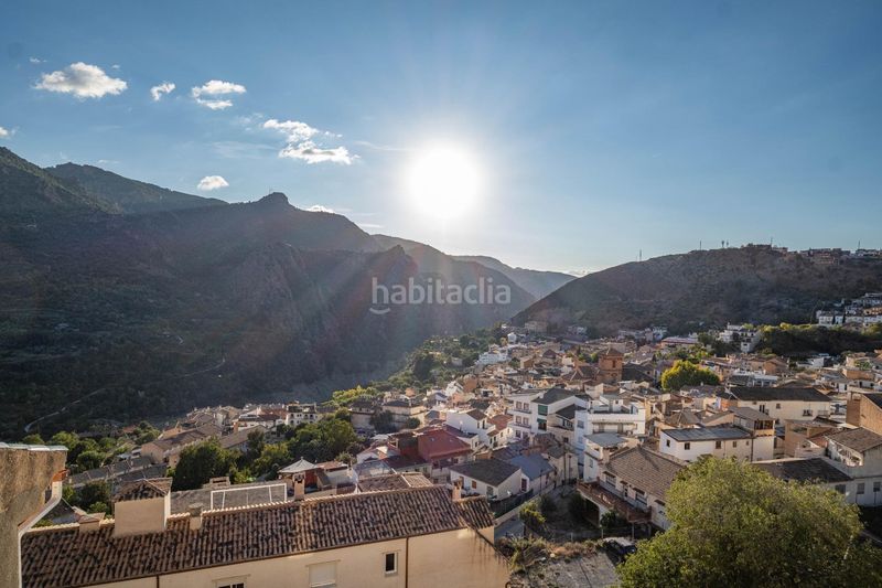 Foto d903308c-30e4-4c81-964f-94a9d09b5524. Casa amb aparcament a Güéjar Sierra