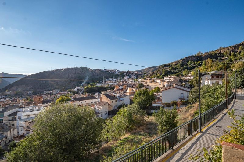 Foto eec8db22-e1a4-4105-90a6-fe617d34c5c8. Casa amb aparcament a Güéjar Sierra