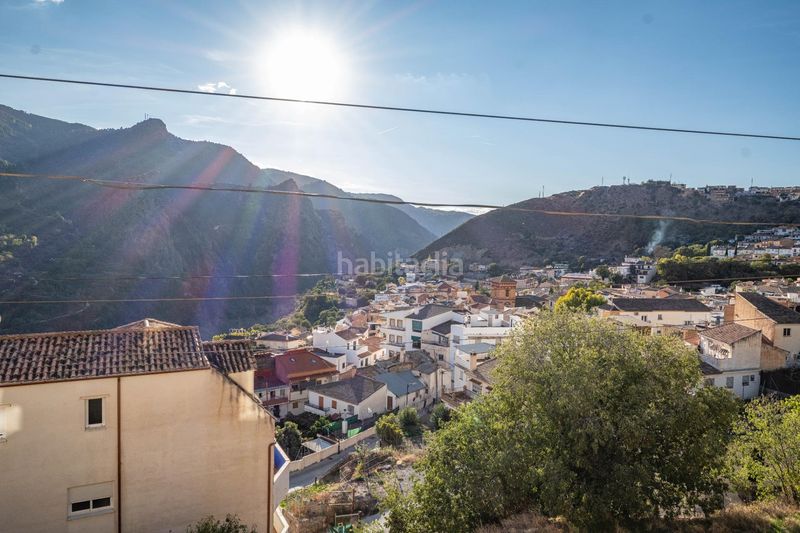 Foto fd4a77ba-4606-4053-8b22-83888888f8fc. Casa amb aparcament a Güéjar Sierra