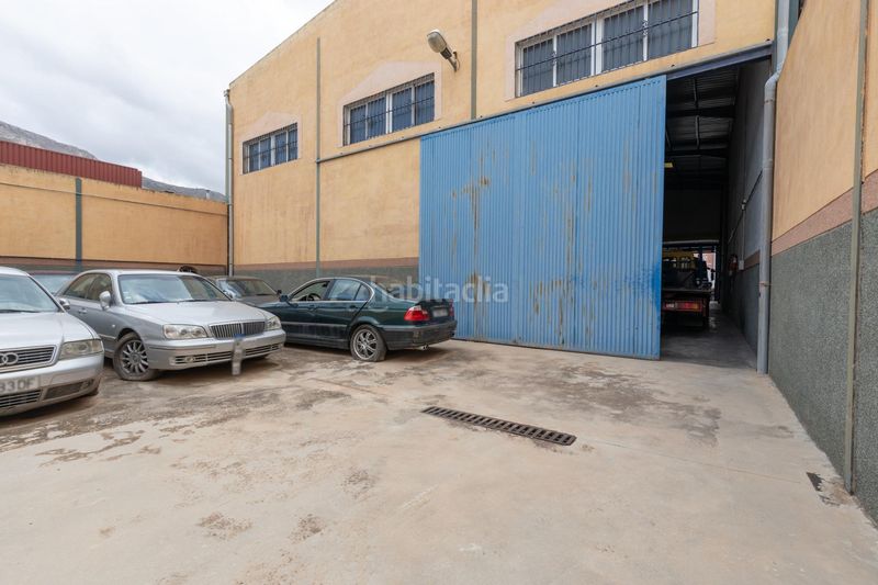 Foto 8b074b1b-b317-4f84-81a9-b0ebc5a86143. Nau industrial a Loja