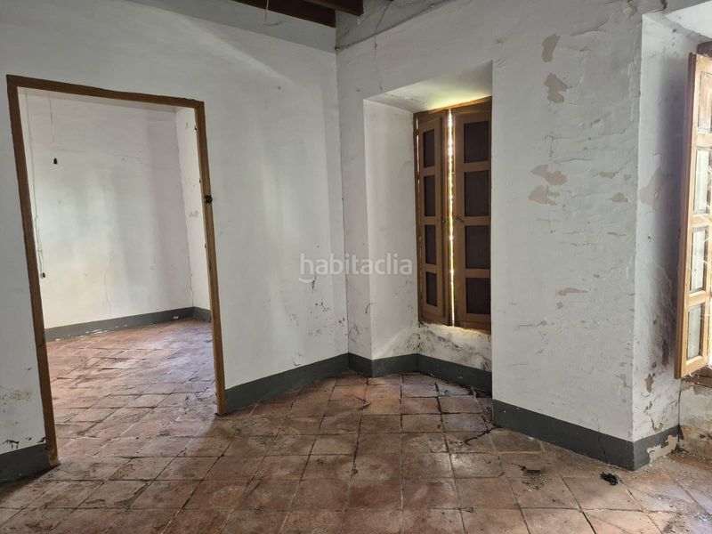Foto 61504bfe-2830-4c00-a493-f72f51cf3766. Casa adossada amb aparcament a Loja