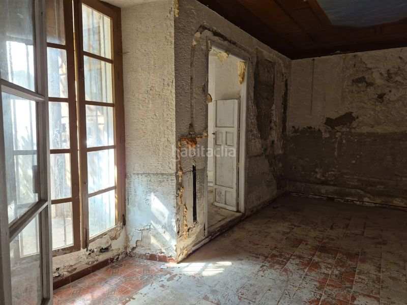 Foto b138ce4d-72b3-4b31-b969-ec5cd342d1f6. Casa adossada amb aparcament a Loja