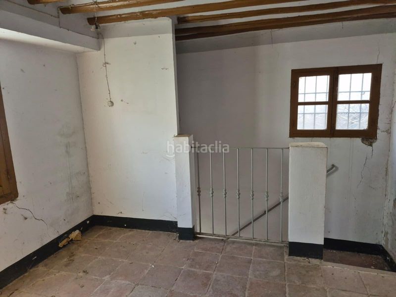 Foto cea1893f-5e39-4f2c-946d-cc7233d6e183. Casa adossada amb aparcament a Loja