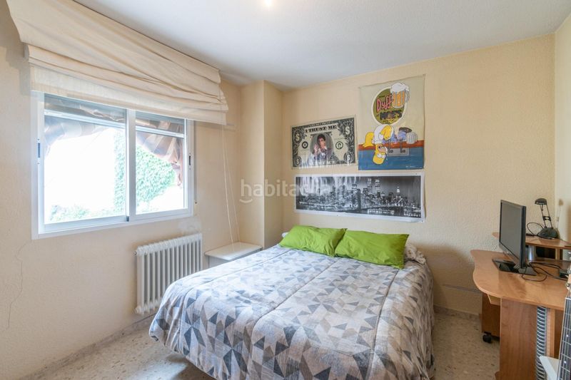 Foto b960556c-d894-4076-bf2e-8180f4bb2358. Casa adossada a calle del pensamiento 19 a La Zubia Ciudad Zubia (La)