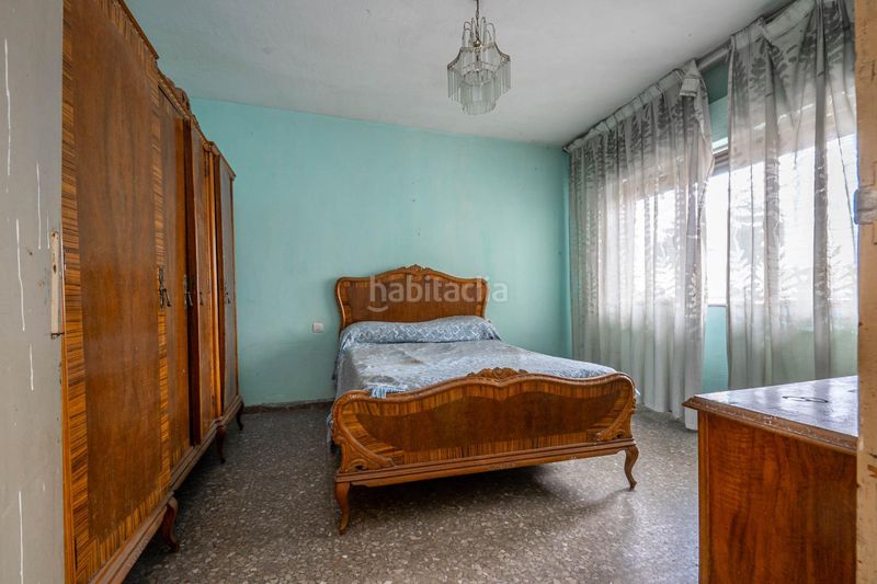Foto d0bff9e5-dfaf-4f72-8fd0-0a3c8a33ab11. Casa adossada a Ogíjares