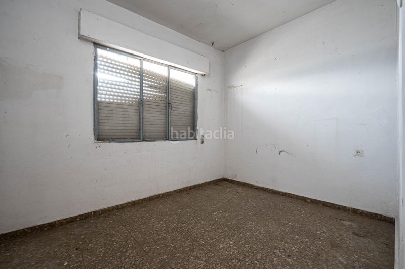Foto d14d861a-79ec-49a6-b48d-a1108a71060e. Casa adossada a Ogíjares