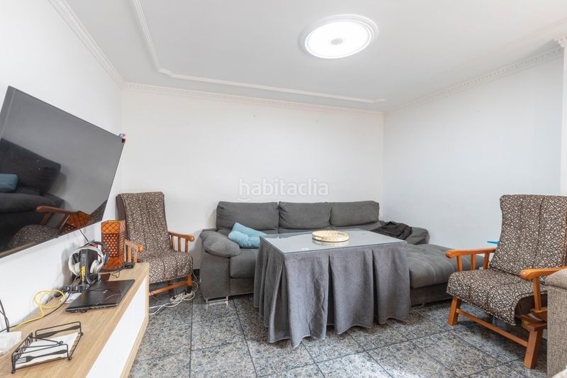 Foto 47b56139-5093-41ca-b0b1-d4a40d7bb6a0. Casa aparellada amb calefacció aparcament a Atarfe