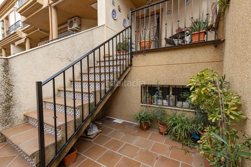 Foto 5c356d5f-1273-485e-bd6d-10f6ed6c9f20. Casa aparellada amb calefacció aparcament a Atarfe
