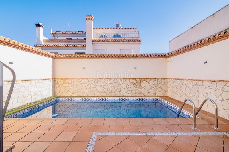 Foto 4b8b56f1-6e9d-4a9f-b148-e20126dedc16. Casa adossada amb calefacció aparcament piscina a Zubia (La)