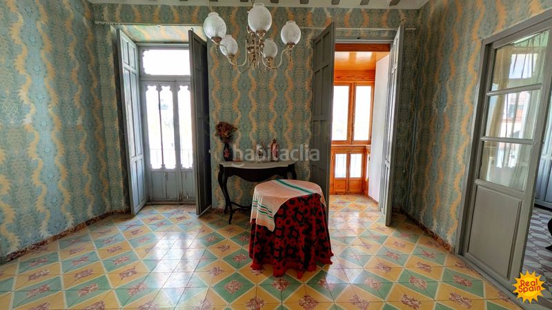 Foto b004fd47-c8c7-4b8d-b699-a4f3f9cf71cc. Casa adossada a Vélez - Rubio