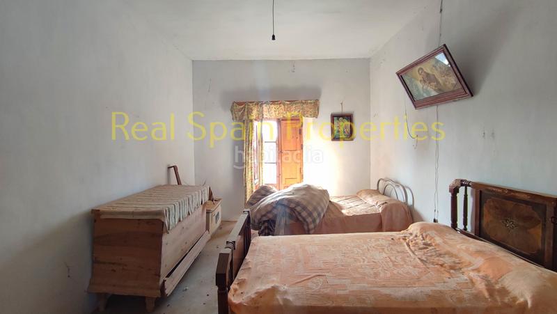 Foto 5bf663f3-e1d0-4ba4-87eb-fc2ad159d77e. Casa adosada en Vélez - Rubio