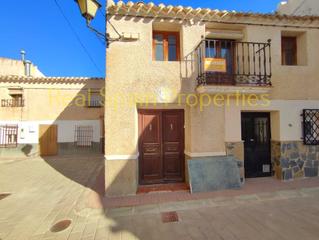 Casa adossada a María