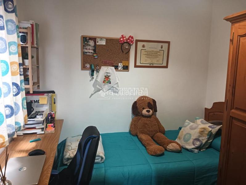 Foto 0e9bca8a-9eda-4d96-a851-9edd2dd28696. Casa aparellada amb aparcament a San Roque - Ronda Norte Badajoz