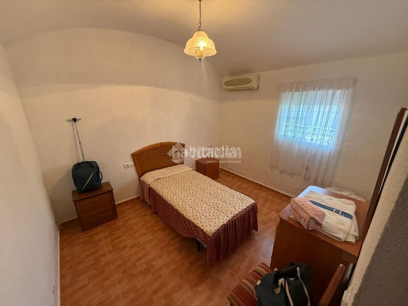 Foto c34d9589-4ee1-4e0d-b9a8-d13ae37d2270. Casa aparellada a Golf Guadiana Badajoz