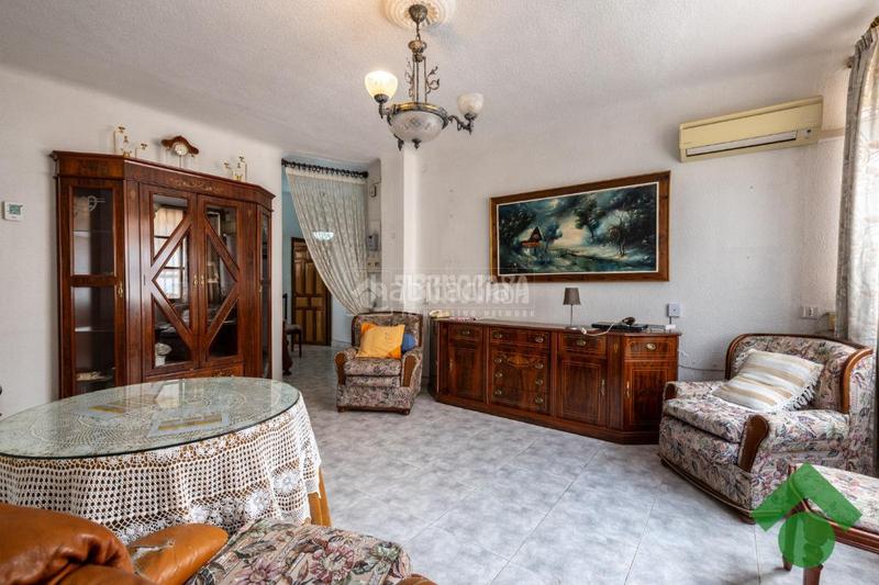 Foto cab3e241-1d5a-4495-b36e-3adb42cb322d. Casa aparellada amb aparcament a San Ildefonso Granada