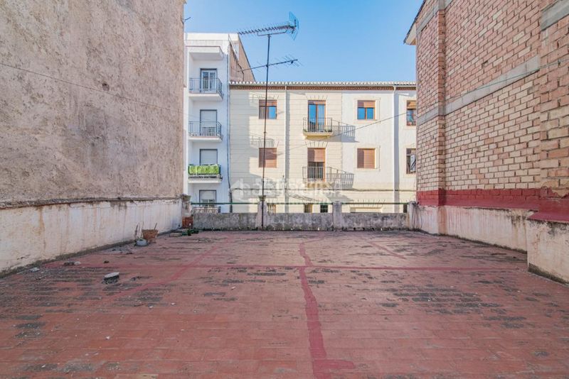 Foto 5e2f6746-d44f-4636-9a61-c5110eb9ef11. Casa aparellada amb aparcament a San Ildefonso Granada