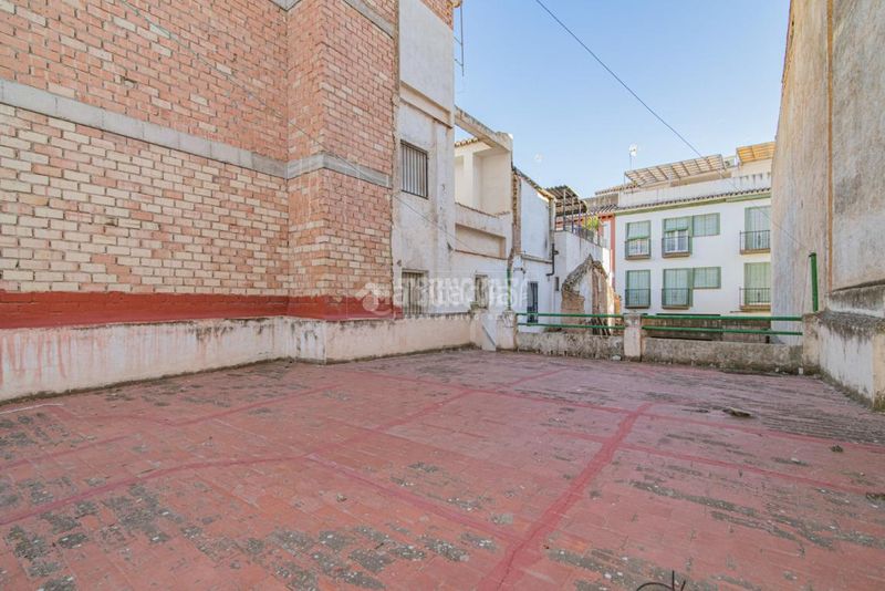 Foto cf626db8-af1b-4928-9447-1d91bc29b654. Casa aparellada amb aparcament a San Ildefonso Granada