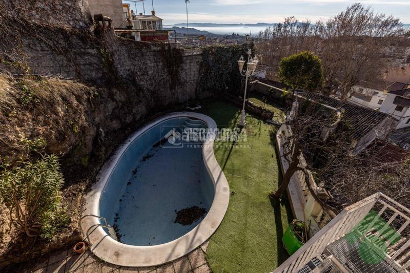 Foto 215e3836-4d17-483e-9d96-3697e5daad8d. Casa aparellada a Alfacar