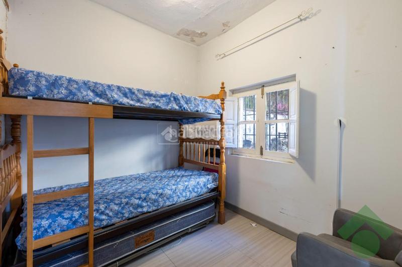 Foto 276f4636-99e4-4e4e-89f6-d89a8c53e01b. Casa aparellada a Alfacar