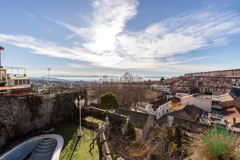 Foto ebc74205-9325-425b-873f-e661fd0a5c70. Casa aparellada a Alfacar