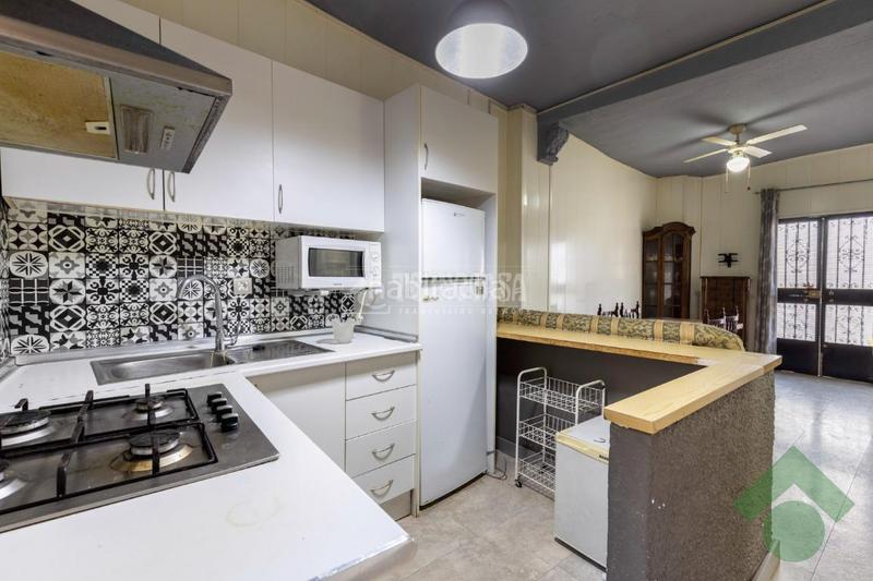 Foto f0c7e2ad-0e90-40e0-9d37-e6b5b3db318a. Casa aparellada a Alfacar