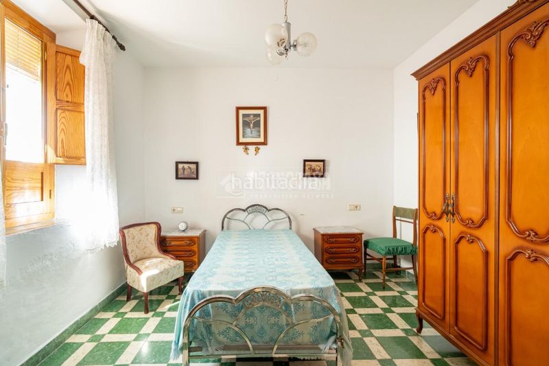 Foto 0c01ceae-9c8a-4659-a00c-4e25c81c6edc. Casa aparellada a Beas de Granada