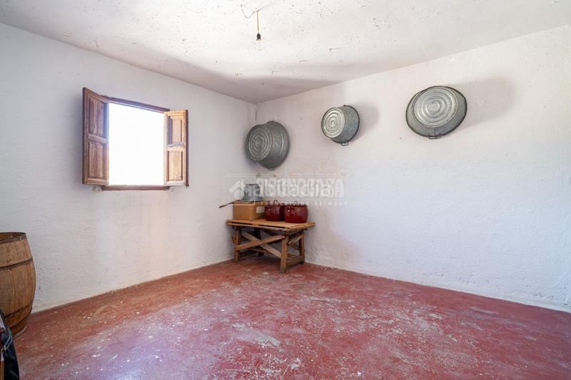 Foto 679c475a-b55e-4014-9535-08a04775b0ec. Casa aparellada a Beas de Granada