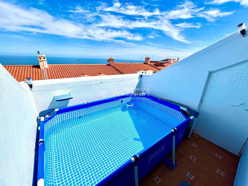 Foto 0dee4679-dd39-4395-8094-23a9aa491122. Casa aparellada amb calefacció aparcament a Centro Benalmádena