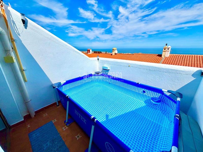 Foto a1f80dfe-f04b-4261-af55-5802cea8a9bb. Casa aparellada amb calefacció aparcament a Centro Benalmádena