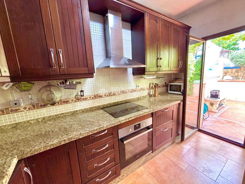 Foto c23679fe-e5da-4c87-927c-3ba77e050b2f. Casa aparellada amb calefacció aparcament a Centro Benalmádena