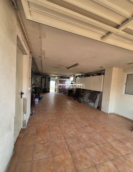 Foto f2a5d955-8be0-449c-b3f6-61b523525f66. Casa adossada a Calafell poble Calafell