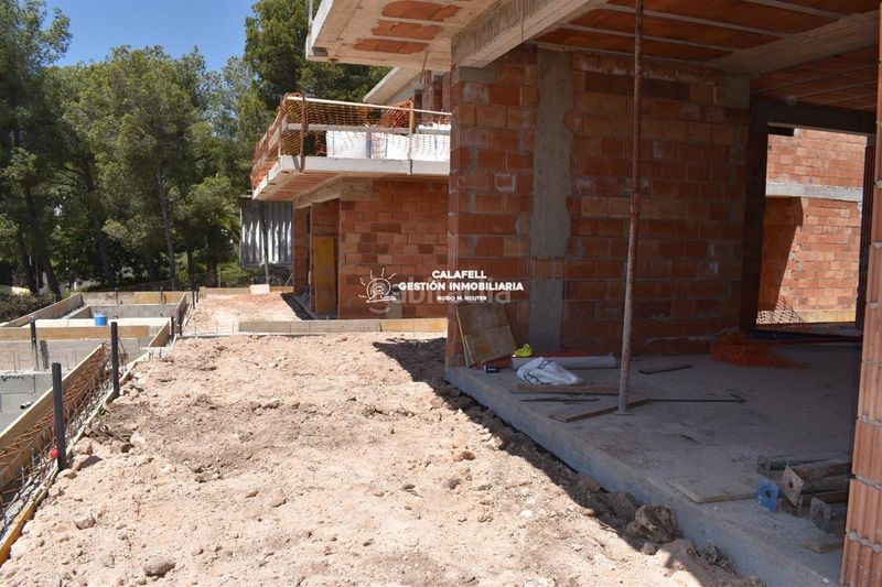 Foto cb020ff0-bb50-494c-bcbc-f6d700718400. Casa adossada amb calefacció piscina a Segur de Calafell nucli urbà Segur de Calafell