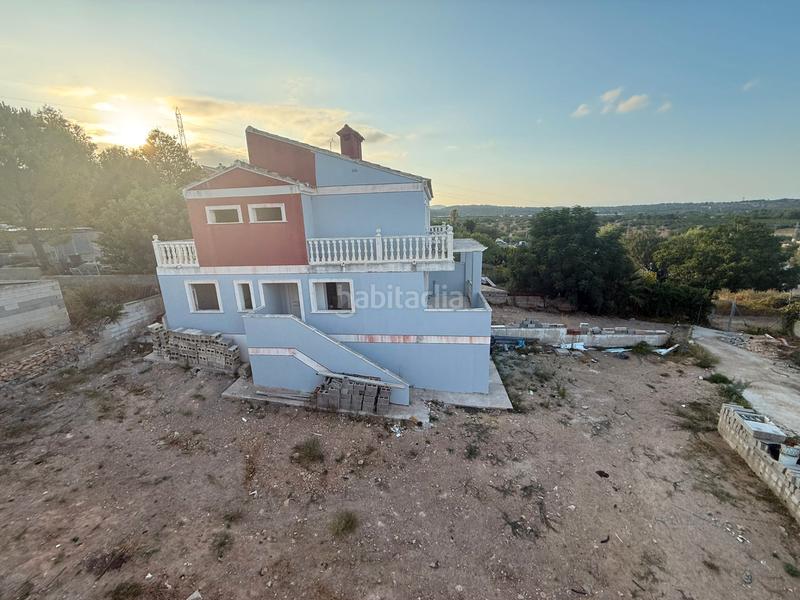 Foto b2d2efc6-1980-4c8b-8146-64c196e9fa77. Casa aparellada a calle opalo 109 a Las Pedrizas Chiva