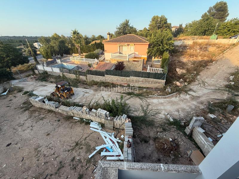 Foto cc3d0d04-c154-49ac-9677-1f2889b69839. Casa aparellada a calle opalo 109 a Las Pedrizas Chiva