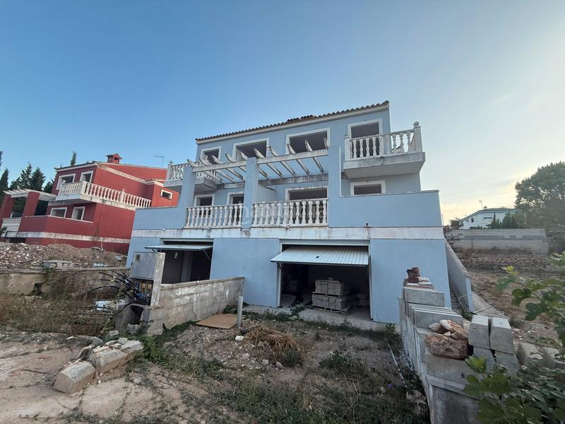 Foto da925432-c29e-45fc-a3b9-d513f22c2fef. Casa aparellada a calle opalo 109 a Las Pedrizas Chiva