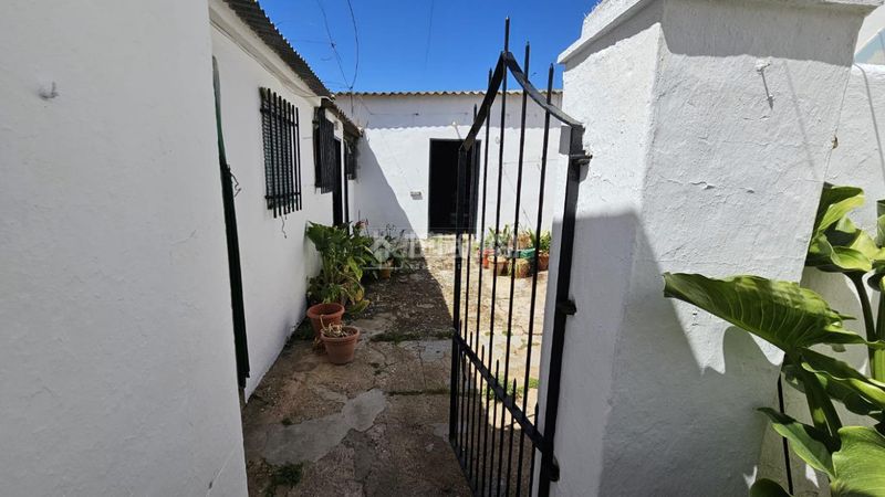 Foto 514db0a9-7a91-465b-ab7c-133fe1df1715. Casa aparellada a Trigueros