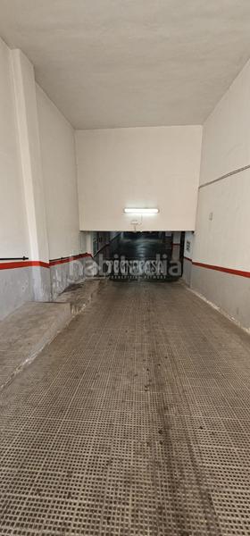 Foto b6ebe2b0-c03d-4acd-807d-86129a662a1a. Parking coche boxplaza de garaje en venta en Nuevo Parque - Los Rosales - Tráfico Pesado Huelva