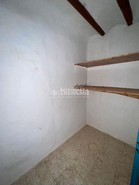 Foto 04915e28-d986-42b8-b7b3-0e12d2c5b429. Casa aparellada a Baeza
