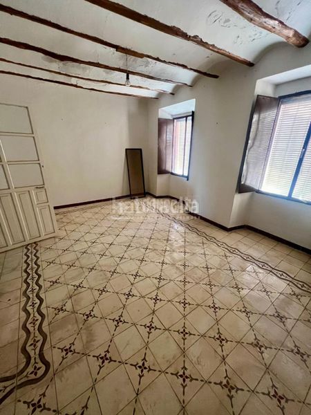 Foto add9c128-1a2a-48c6-8d21-02330df9fb63. Casa aparellada a Baeza