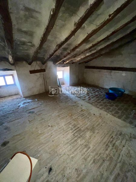 Foto b968d828-7709-4ec0-bdb3-cf7658ed38fe. Casa aparellada a Baeza