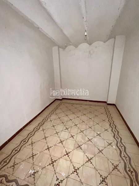 Foto f82c0795-746d-4070-b64f-aa5d9f787fdf. Casa aparellada a Baeza