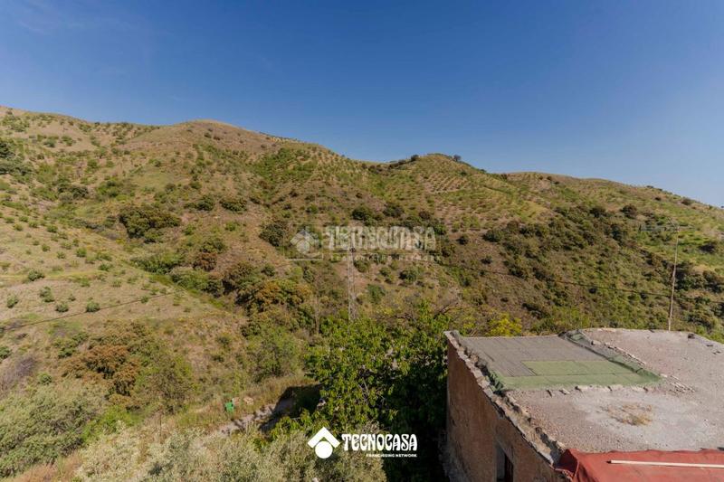 Foto 0bf6960b-4fcc-49e9-b0c8-c49430df61ee. Masía casa rural en venta en Torvizcón